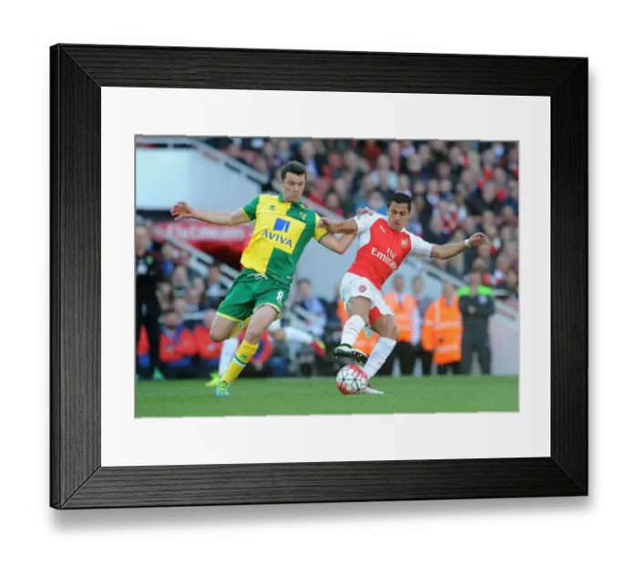 Framed Print : Clash of Stars: Alexis Sanchez vs. Jonny Howson in Arsenal's Battle Against Norwich Framed Print : Clash of Stars: Alexis Sanchez vs. Jonny Howson in Arsenal's Battle Against Norwich