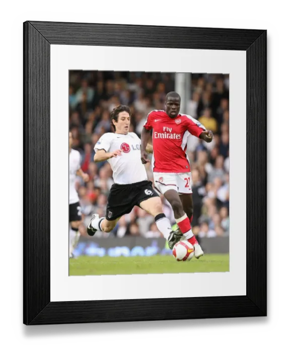 Framed Print : Emmanuel Eboue (Arsenal) Andranik (Fulham) Framed Print : Emmanuel Eboue (Arsenal) Andranik (Fulham)