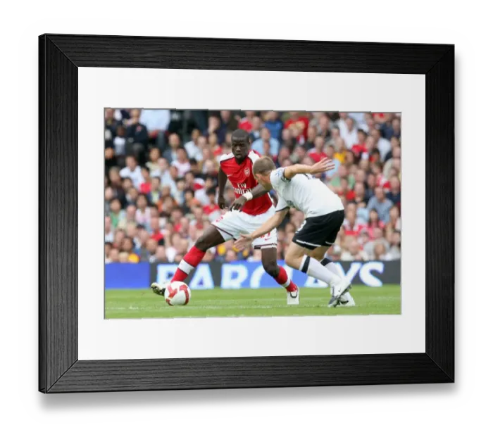 Framed Print : Emmanuel Eboue (Arsenal) Danny Murphy (Fulham) Framed Print : Emmanuel Eboue (Arsenal) Danny Murphy (Fulham)