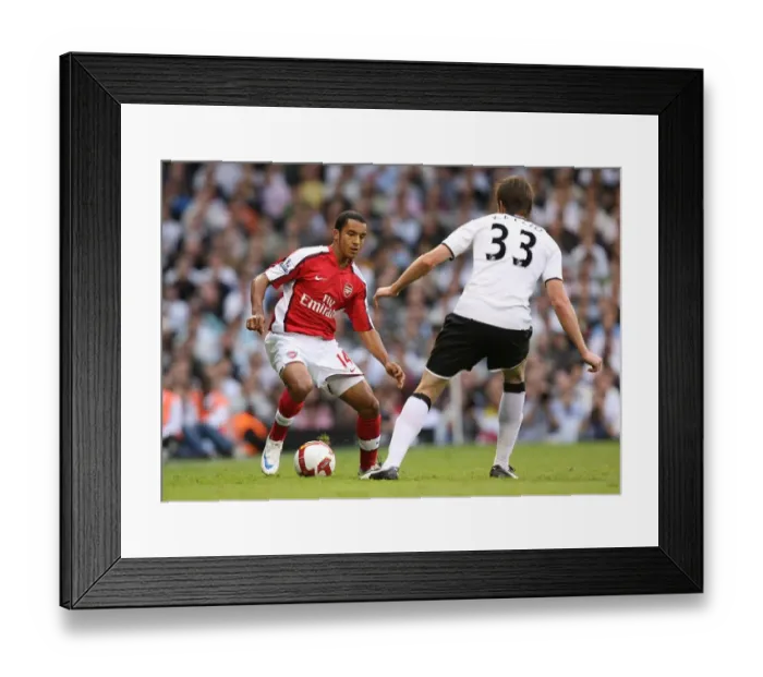 Framed Print : Theo Walcott (Arsenal) Toni Kallio (Fulham)