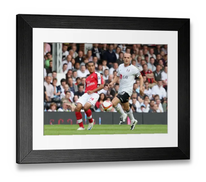 Framed Print : Theo Walcott (Arsenal) Danny Murphy (Fulham) Framed Print : Theo Walcott (Arsenal) Danny Murphy (Fulham)