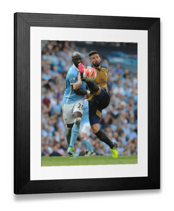 Framed Print : Clash at the Etihad: Olivier Giroud vs. Eliaquim Mangala - Premier League Showdown: Manchester City vs. Arsenal