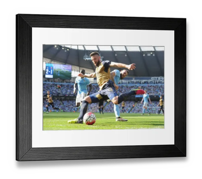 Framed Print : Giroud Surges Past Otamendi: Manchester City vs. Arsenal, Premier League Battle (2016)