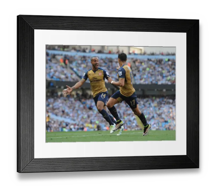 Framed Print : Arsenal's Double Delight: Sanchez and Walcott Celebrate Goals Against Manchester City (May 2016)