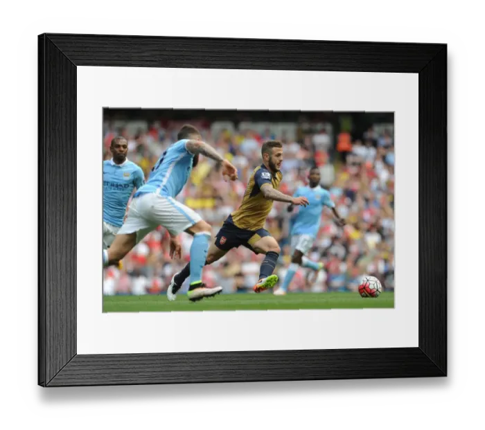 Framed Print : Wilshere vs. Otamendi: A Premier League Showdown at the Manchester Derby (May 2016) Framed Print : Wilshere vs. Otamendi: A Premier League Showdown at the Manchester Derby (May 2016)