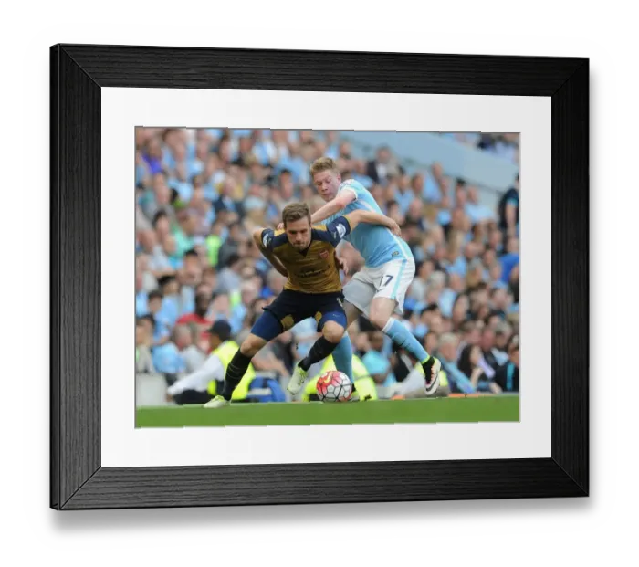 Framed Print : Ramsey vs. De Bruyne: A Premier League Battle - Manchester City vs. Arsenal (2016) Framed Print : Ramsey vs. De Bruyne: A Premier League Battle - Manchester City vs. Arsenal (2016)