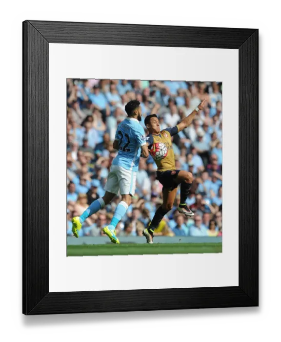 Framed Print : Manchester Derby Showdown: Alexis Sanchez vs. Gael Clichy in Intense Arsenal-Man City Clash (2015-16)