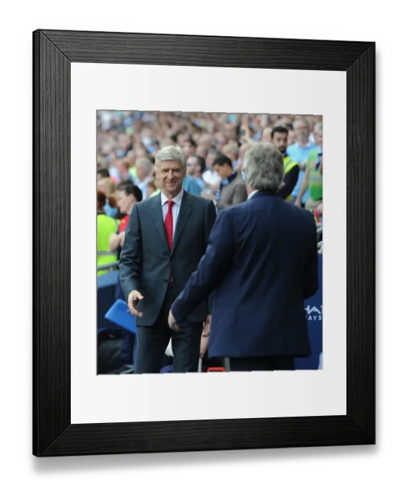 Framed Print : Arsene Wenger and Manuel Pellegrini's Pre-Match Handshake: Manchester City vs. Arsenal, Premier League 2015-16