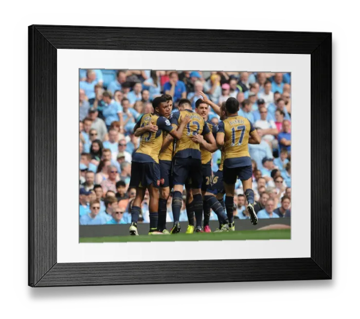Framed Print : Olivier Giroud celebrates scoring Arsenals 1st goal with his team mates