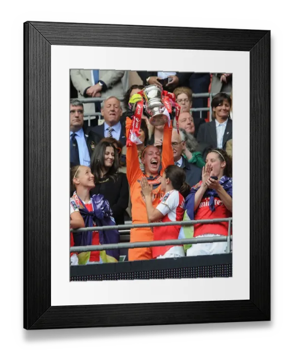 Framed Print : Arsenal Ladies Celebrate FA Cup Victory: Sari van Veenendal Lifts the Trophy
