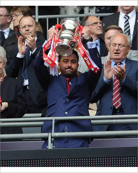 Arsenal Ladies FA Cup Victory: Pedro Martinez Losa Celebrates with the Trophy