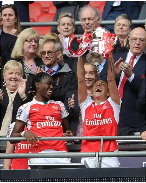 Arsenal Ladies Celebrate FA Cup Victory: Fara Williams and Asisat Oshoala Lift the Trophy
