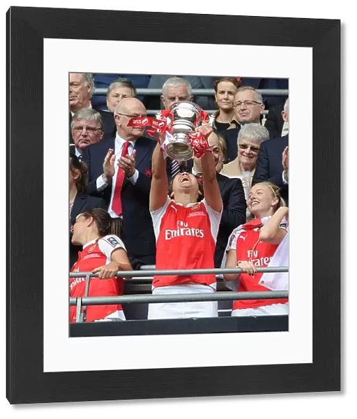 Arsenal Ladies Celebrate FA Cup Victory: Josephine Henning Lifts the Trophy