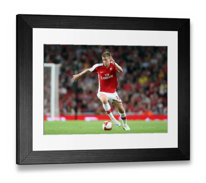 Framed Print : Arsenal's Nicklas Bendtner Scores in Emphatic 4-0 UEFA Champions League Victory over FC Twente