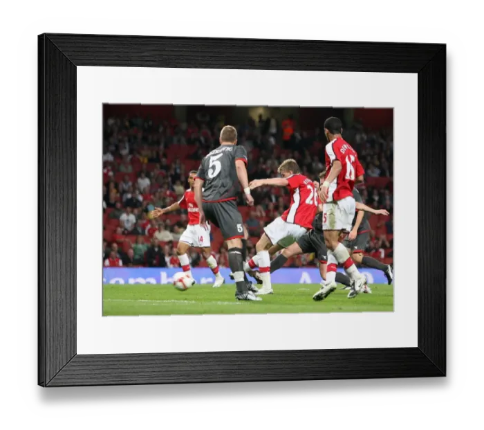 Framed Print : Bendtner's Brilliant Goal: Arsenal Crushes FC Twente 4-0 in Champions League