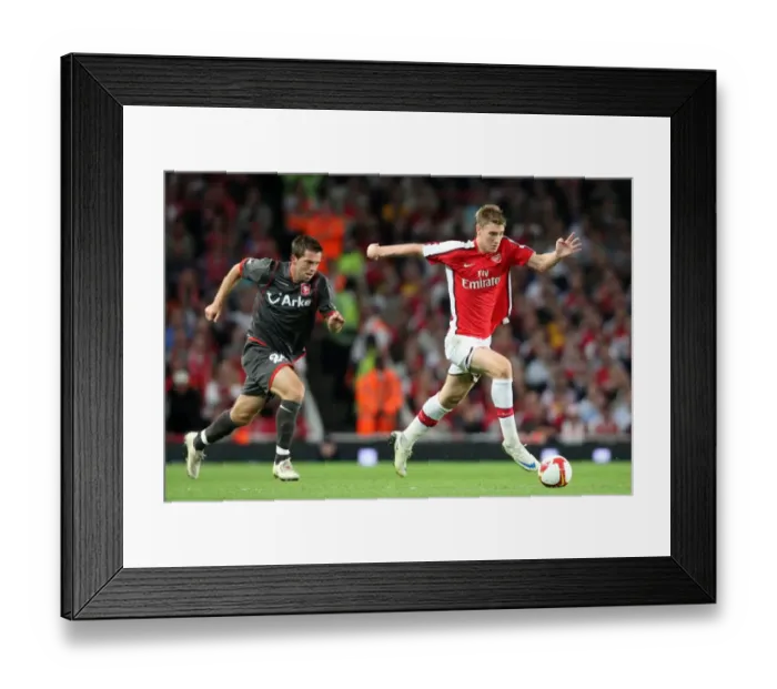 Framed Print : Nicklas Bendtner (Arsenal) Theo Janssen (Twente) Framed Print : Nicklas Bendtner (Arsenal) Theo Janssen (Twente)