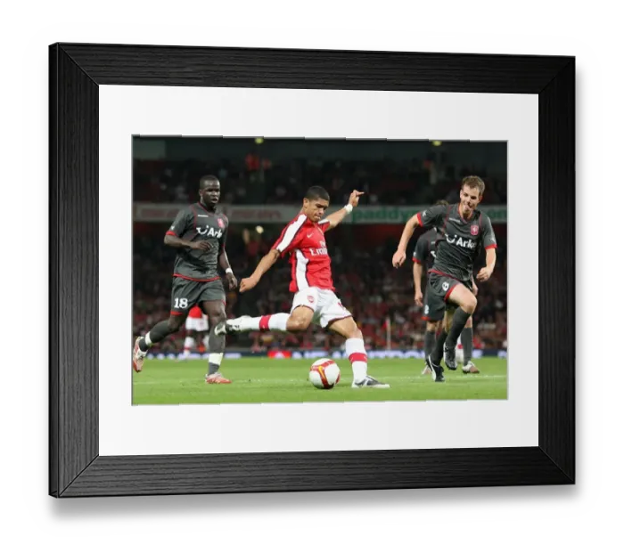 Framed Print : Denilson vs. Wout Brama: Arsenal's Dominance over FC Twente in the UEFA Champions League (4-0) Framed Print : Denilson vs. Wout Brama: Arsenal's Dominance over FC Twente in the UEFA Champions League (4-0)