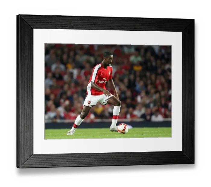Framed Print : Arsenal's Johan Djourou Celebrates in Arsenal's 4-0 Victory over FC Twente in the UEFA Champions League