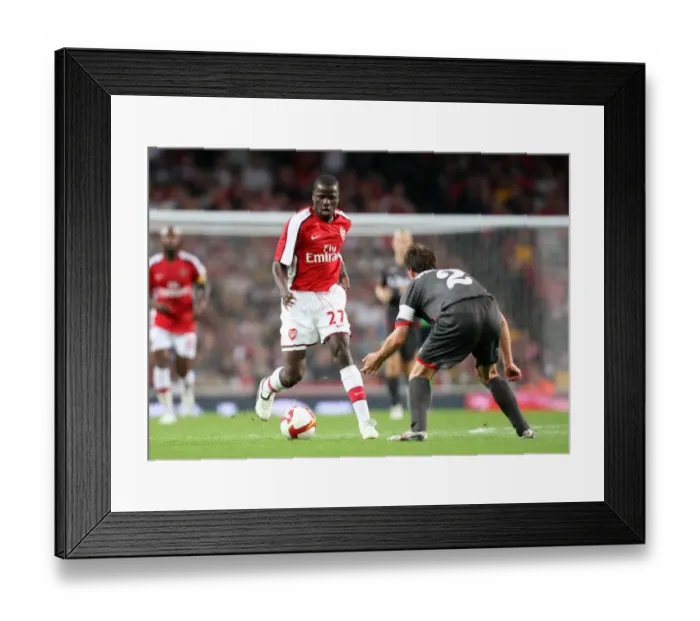 Framed Print : Emmanuel Eboue (Arsenal) Robbie Wielaert (Twente) Framed Print : Emmanuel Eboue (Arsenal) Robbie Wielaert (Twente)