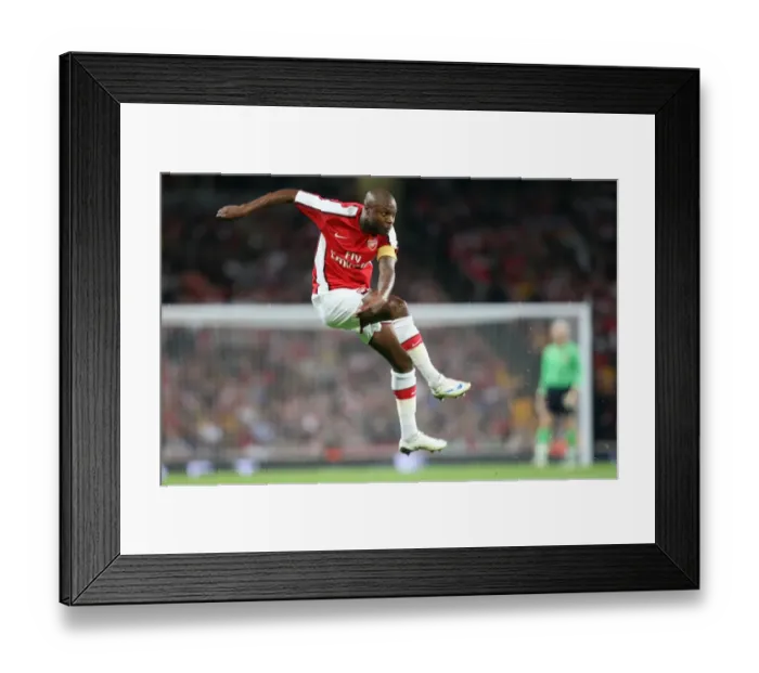 Framed Print : William Gallas's Dominant Performance: Arsenal's 4-0 Crush of FC Twente in Champions League Qualifier