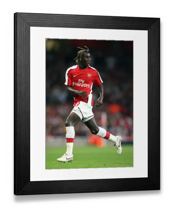 Framed Print : Arsenal's Unstoppable Force: Bacary Sagna Leads 4-0 UEFA Champions League Victory