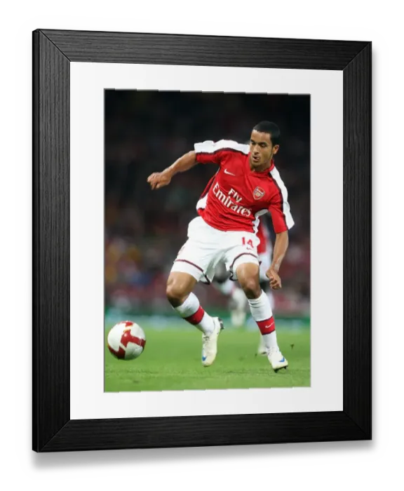 Framed Print : Theo Walcott's Brilliant Performance: Arsenal's 4-0 UEFA Champions League Victory