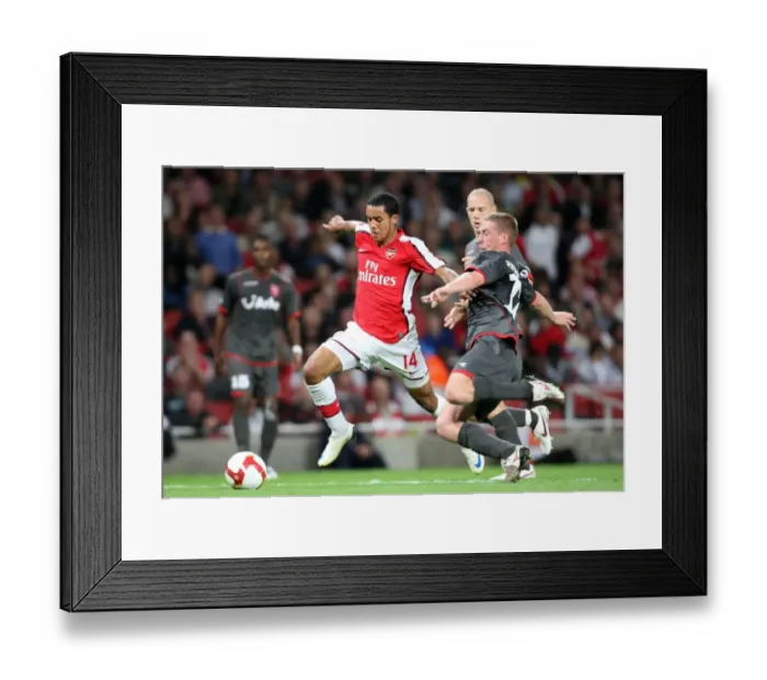 Framed Print : Theo Walcott's Brilliant Performance: Arsenal's 4-0 UEFA Champions League Victory Over FC Twente Framed Print : Theo Walcott's Brilliant Performance: Arsenal's 4-0 UEFA Champions League Victory Over FC Twente
