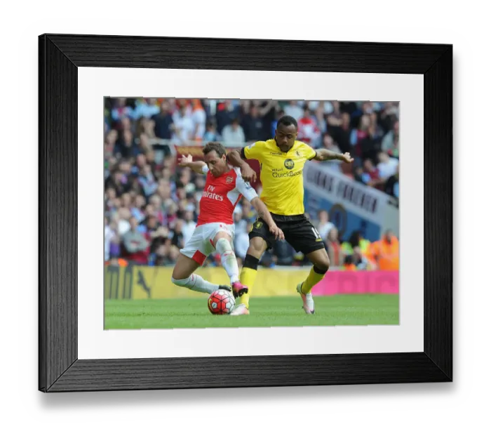 Framed Print : Intense Battle: Santi Cazorla vs Jordan Ayew at the Emirates (May 2016)