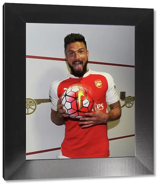 Olivier Giroud Celebrates with Match Ball: Arsenal Secures Victory over Aston Villa (2015-16)