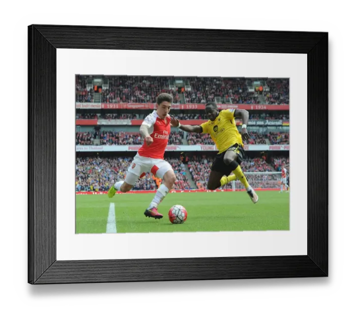 Framed Print : Bellerin vs. Cissokho: Intense Battle in Arsenal's Premier League Clash Against Aston Villa