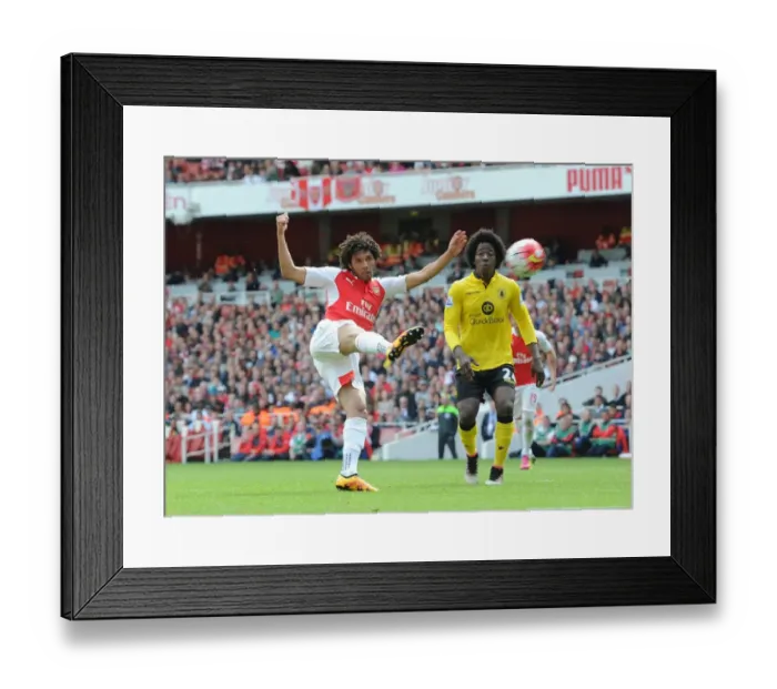 Framed Print : Elneny vs Sanchez: Tense Shootout at Emirates Framed Print : Elneny vs Sanchez: Tense Shootout at Emirates