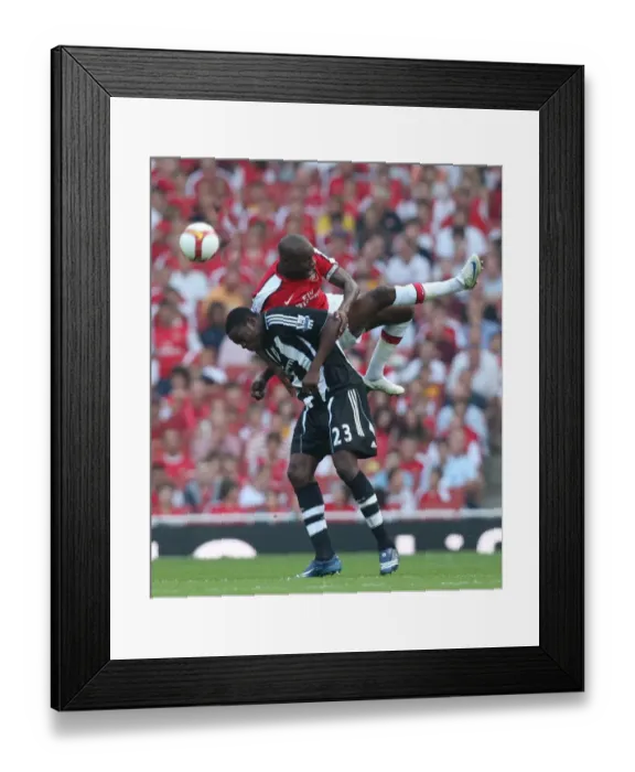 Framed Print : William Gallas (Arsenal) Shola Ameobi (Newcastle) Framed Print : William Gallas (Arsenal) Shola Ameobi (Newcastle)