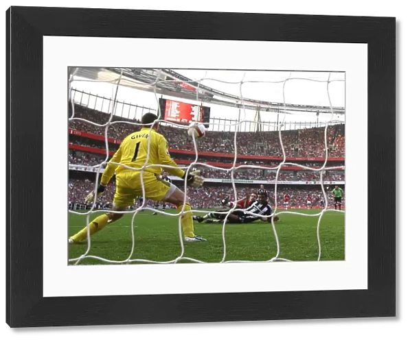 Robin van Persie shoots past Shay Given to score the 2nd Arsenal goal