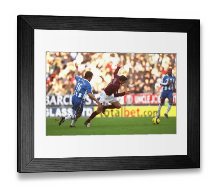 Framed Print : Van Persie's Spinning Goal: Arsenal's First at Wigan, 2005 Framed Print : Van Persie's Spinning Goal: Arsenal's First at Wigan, 2005