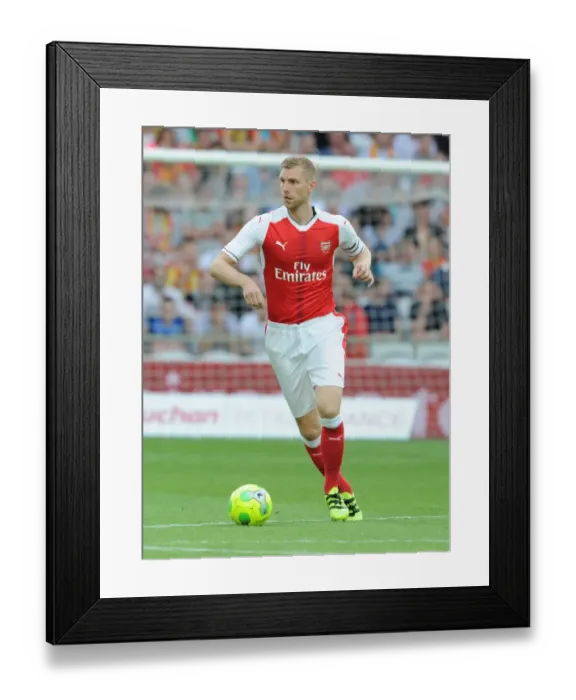 Framed Print : Per Mertesacker in Action: Arsenal's Pre-Season Friendly against RC Lens, 2016