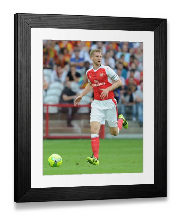 Framed Print : Arsenal's Per Mertesacker in Action at Lens Pre-Season Friendly, 2016 Framed Print : Arsenal's Per Mertesacker in Action at Lens Pre-Season Friendly, 2016