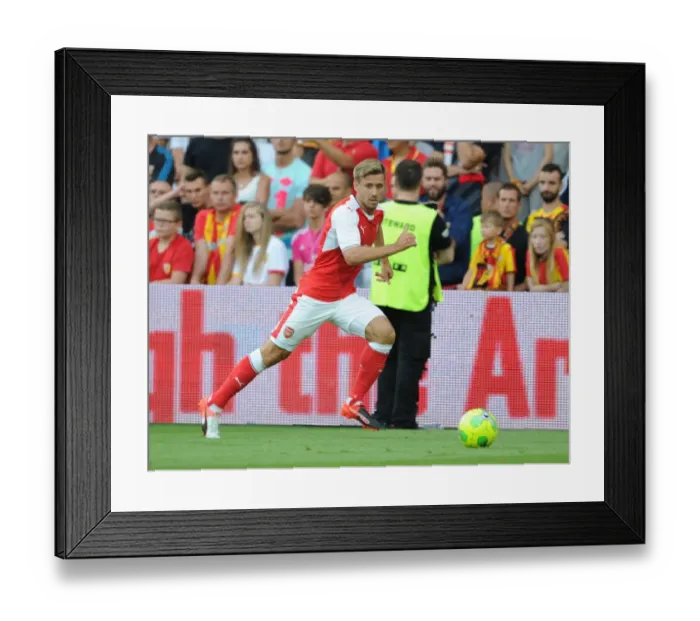 Framed Print : Arsenal's Nacho Monreal in Pre-Season Action: Lens vs Arsenal (2016)