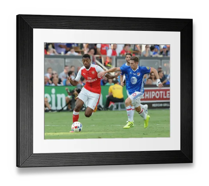 Framed Print : SAN JOSE, CA - JULY 28: Jeff Reine-Adelaide of Arsenal takes on Wil Trapp of the MLS Allstars during the match between Framed Print : SAN JOSE, CA - JULY 28: Jeff Reine-Adelaide of Arsenal takes on Wil Trapp of the MLS Allstars during the match between