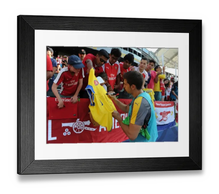 Framed Print : Emiliano Martinez Greets Fans with Autograph Signing Before Arsenal vs CD Guadalajara Match Framed Print : Emiliano Martinez Greets Fans with Autograph Signing Before Arsenal vs CD Guadalajara Match