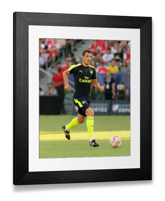 Framed Print : Granit Xhaka: In Action for Arsenal Against CD Guadalajara, 2016 Framed Print : Granit Xhaka: In Action for Arsenal Against CD Guadalajara, 2016
