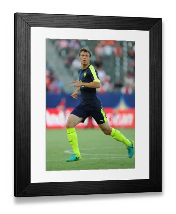 Framed Print : Arsenal's Krystian Bielik Faces Off Against Chivas in Pre-Season Friendly