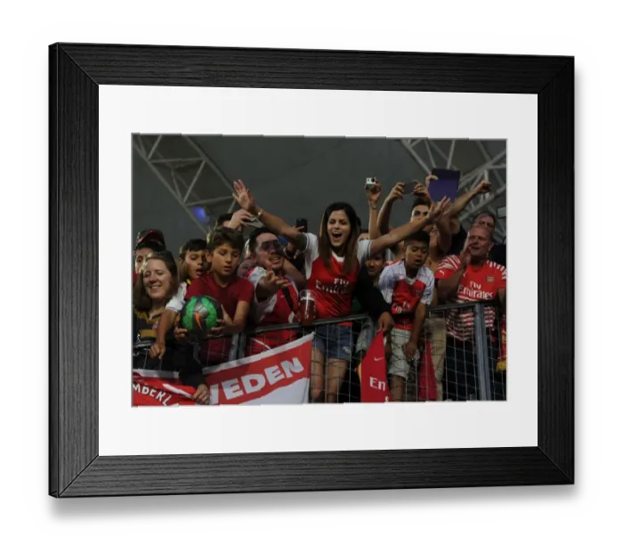 Framed Print : Arsenal Fans in Full Force: A Sea of Red at Arsenal vs. Chivas Pre-Season Match in Carson, California
