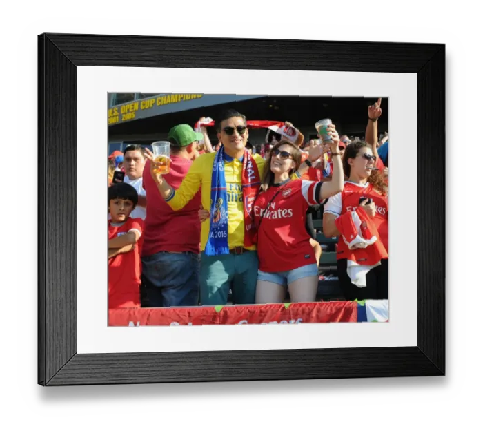 Framed Print : Arsenal Fans in Full Force: A Sea of Passion at Arsenal vs. Chivas Pre-Season Match in Carson, California