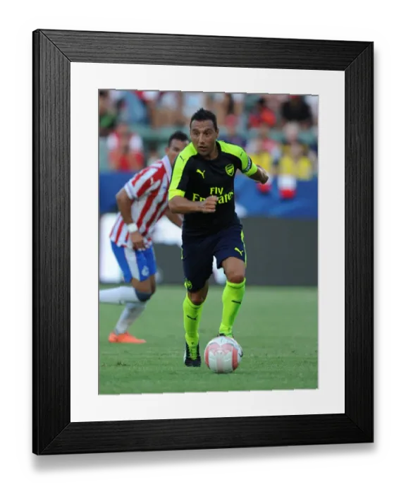 Framed Print : Arsenal's Santi Cazorla in Action Against CD Guadalajara, 2016: Pre-Season Friendly