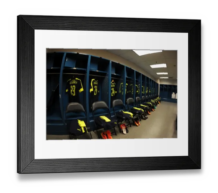 Framed Print : Arsenal FC: Pre-Season Nerve Center - Arsenal Changing Room before Arsenal vs. CD Guadalajara Match
