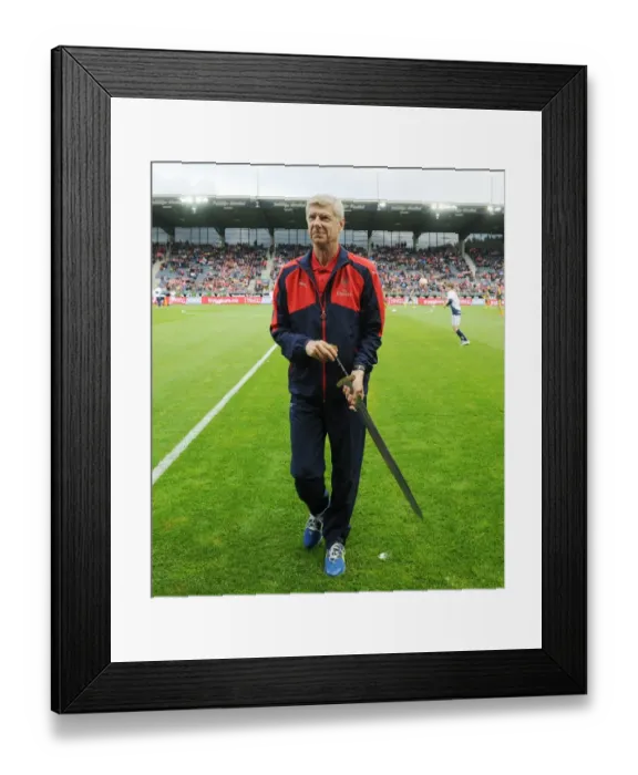 Framed Print : Arsene Wenger Receives Viking Sword at Viking FK vs Arsenal Friendly (2016) Framed Print : Arsene Wenger Receives Viking Sword at Viking FK vs Arsenal Friendly (2016)