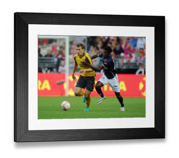 Framed Print : Arsenal's Krystian Bielik Outmuscles Usman Sala in Exciting Pre-Season Clash Framed Print : Arsenal's Krystian Bielik Outmuscles Usman Sala in Exciting Pre-Season Clash