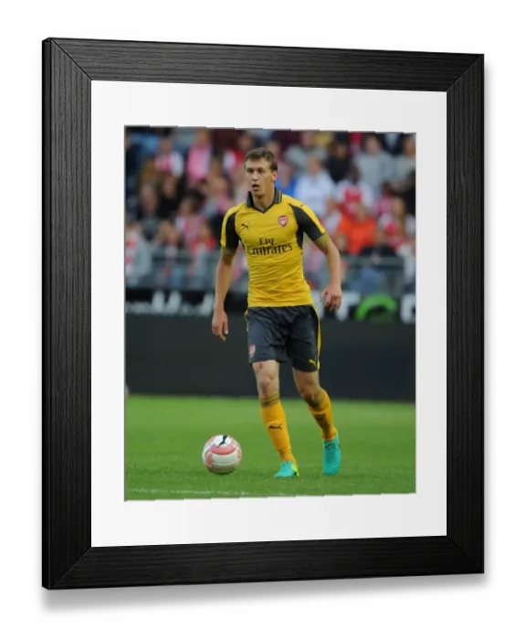 Framed Print : Arsenal's Krystian Bielik in Action against Viking FK, 2016