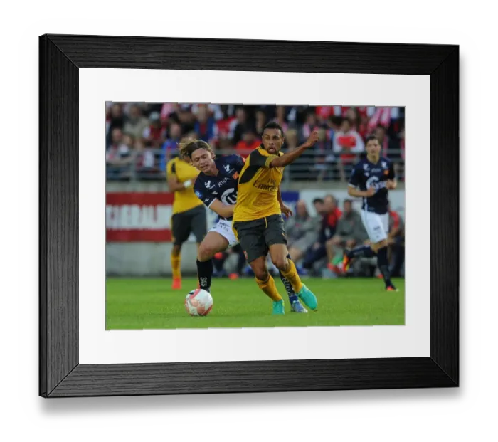 Framed Print : Coquelin vs Ryerston: A Battle on the Pitch - Viking FK vs Arsenal Pre-Season Friendly