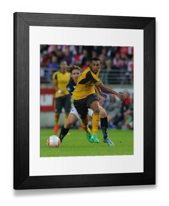 Framed Print : Coquelin vs Ryerston: A Battle on the Football Field - Viking FK vs Arsenal Pre-Season Clash